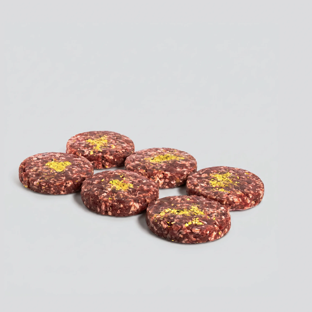 Burger meat gourmet de ternera con cebolla caramelizada y pistacho.